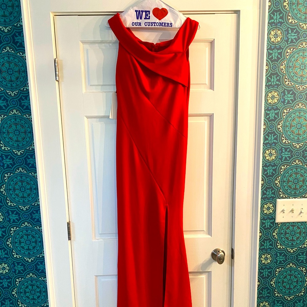 Red long sleeveless dress.